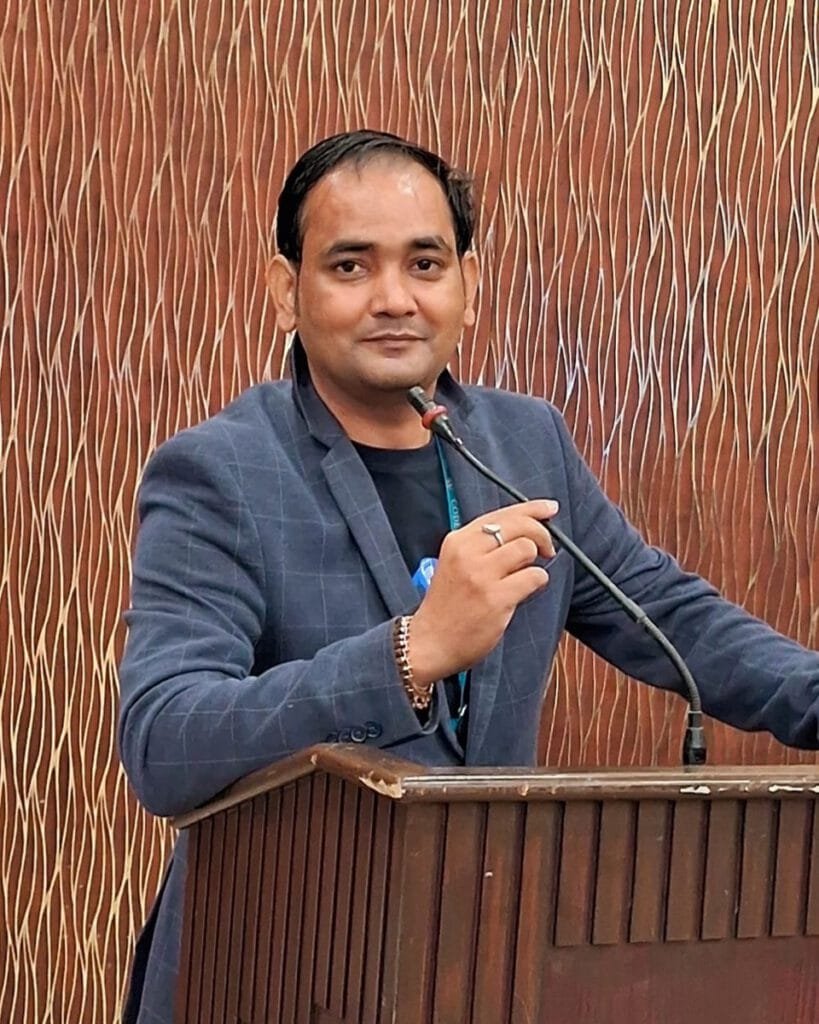 Rabin Kumar Pal speaking at a lectern